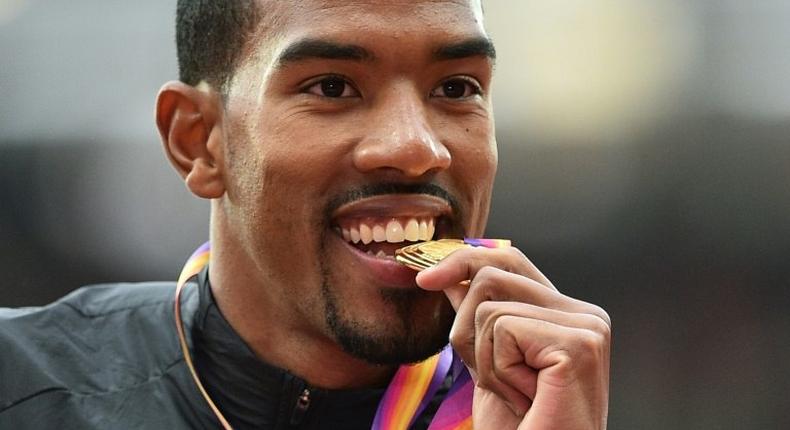 Gold medallist US athlete Christian Taylor poses on the podium during the victory ceremony for the men's triple jump athletics event at the 2017 IAAF World Championships at the London Stadium in London August 11, 2017