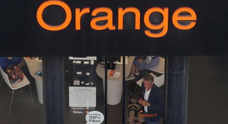 The Orange telephone company logo is seen in front of a shop in Paris, France