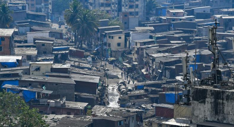 Social distancing is near impossible for the roughly one million people in the Dharavi slum in Mumbai