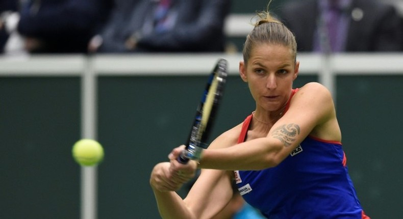 Karolina Pliskova of Czech Republic returns a ball to Garbine Muguruza of Spain during the Fed Cup on February 12, 2017 in Ostrava