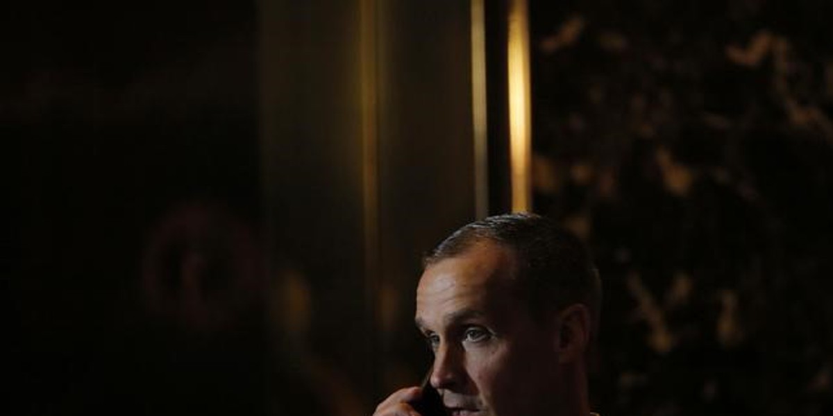 Corey Lewandowski, former campaign manager for Republican US presidential candidate Donald Trump, talks on the phone in New York.