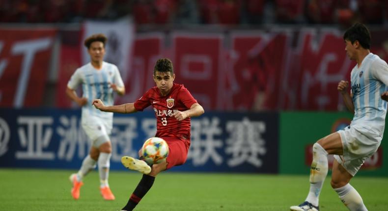 Hat-trick hero: Shanghai SIPG's Oscar curls home his second, a beauty from the edge of the box against Ulsan