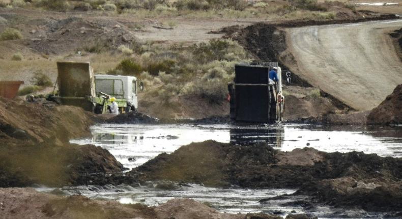This handout photo distributed by Greenpeace on December 17, 2018 shows an illegal waste dump, where toxic fracking waste chemicals are poured in Vaca Muerta, Neuquen province, Argentina