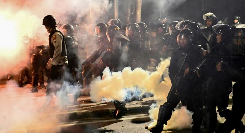 Police in Jakarta clashed with some anti-Widodo protesters who had refused to leave after the end of an otherwise peaceful demonstration