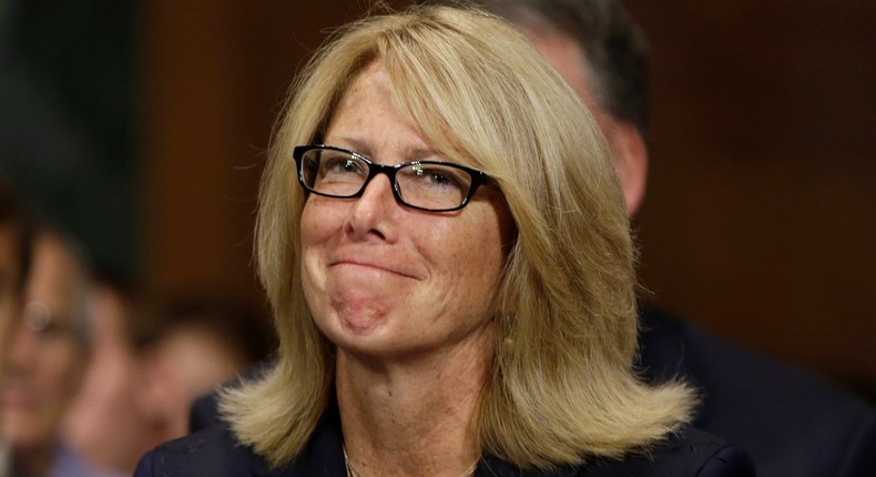 Patrice Comey, the wife of FBI director nominee James Comey (not pictured) watches her husband testify before the Senate Judiciary Committee on Capitol Hill in Washington July 9, 2013.