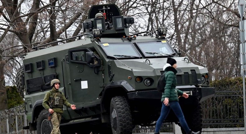 Ukrainian Military Forces servicemen block a road in Kyiv, Ukraine, on February 24, 2022.