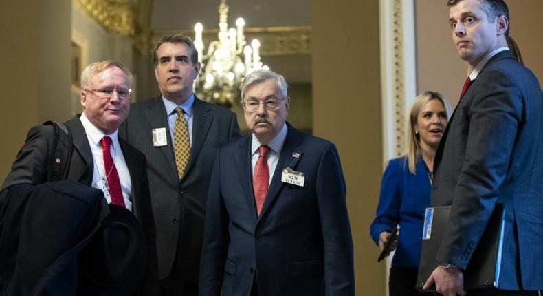 Terry Branstad (centre) became US ambassador to China in May 2017