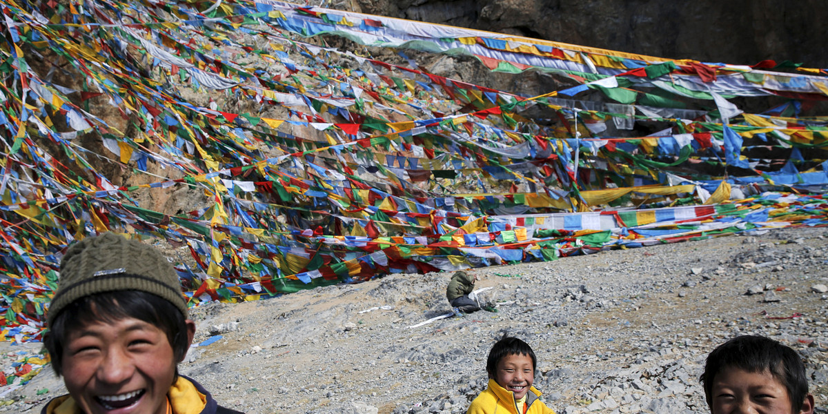 Prayer flags on the shores of the  Namtso lake.