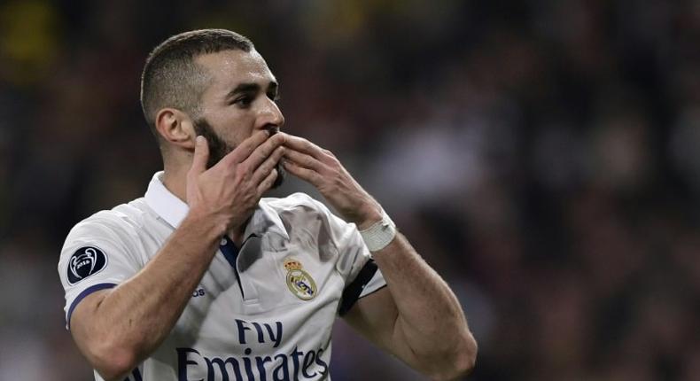 Real Madrid's French forward Karim Benzema is suspected of acting as an intermediary between the presumed blackmailers including one of his childhood friends and Lyon midfielder Mathieu Valbuena