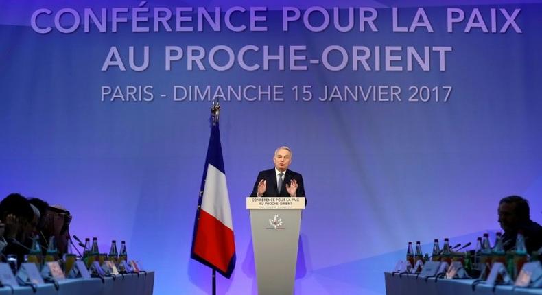 French Minister of Foreign Affairs Jean-Marc Ayrault addresses delegates at the opening of the Middle East peace conference in Paris on January 15, 2017