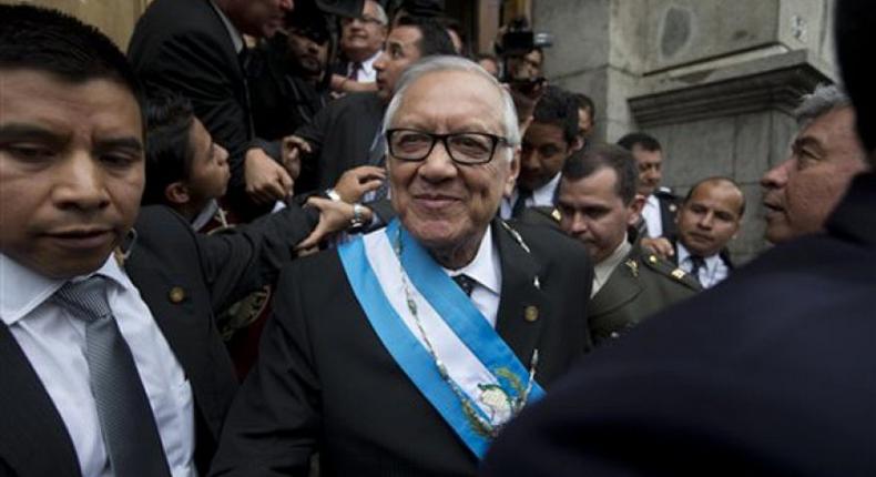 The new Guatemalan President-Alejandro Maldonado, with security details.