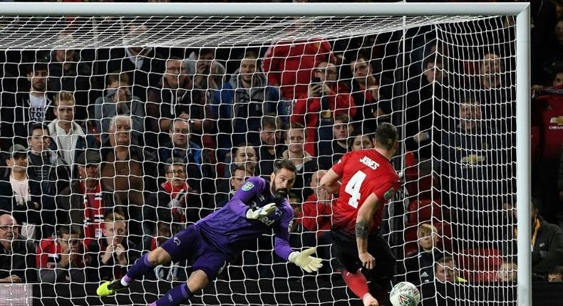 Phil Jones missed the crucial spot-kick as Derby eliminated Manchester United from the League Cup on penalties