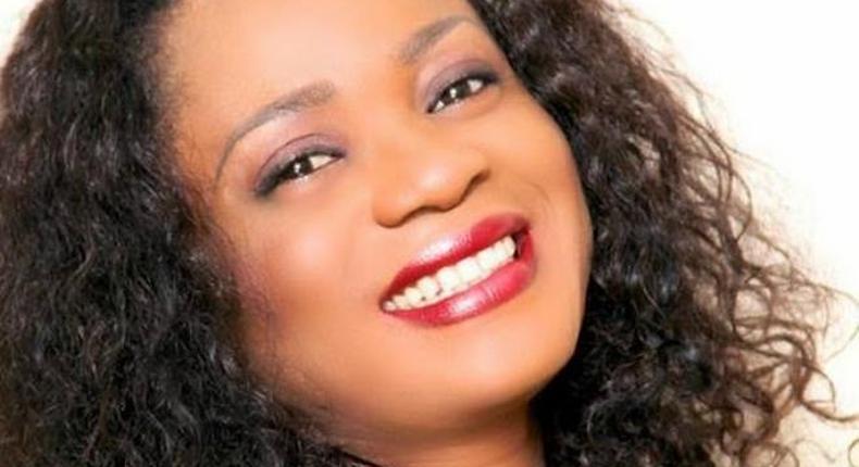 Steph Nora Okere showing off her beautiful dentition in a photo shoot