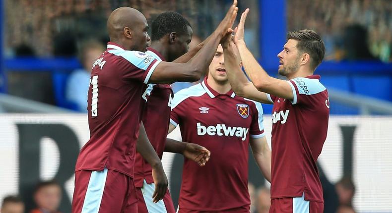 West Ham defender Angelo Ogbonna (L) celebrates after scoring at Everton Creator: Lindsey Parnaby