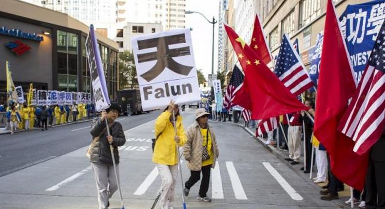 Rights protesters, China supporters greet President Xi in Seattle