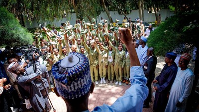 President Muhammadu Buhari with corps members in Daura, Katsina State