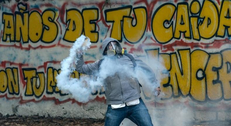 Students clash with riot police in Venezuela where the death toll from anti-government unrest continues to mount