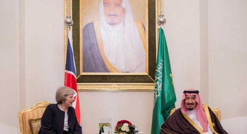 Saudi King Salman meets Theresa May during the Gulf Cooperation Council summit in Manama on December 6, 2016