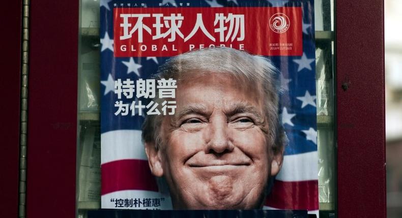 US President-elect Donald Trump features on a magazine front cover on a Shanghai news stand, on December 14, 2016