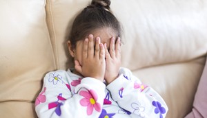 The author (not pictured) called her mom when she was 9 to come get her from a sleepover.DBenitostock/Getty Images