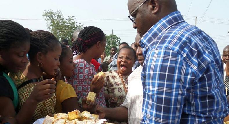 Fayose celebrates 56th birthday with traders on the streets