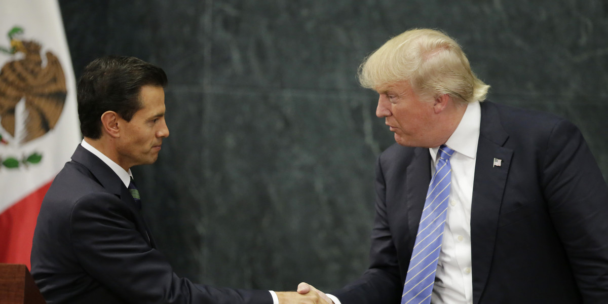 President Donald Trump and Mexican President Enrique Peña Nieto shake hands at the Los Pinos presidential residence in Mexico City, August 31, 2016.
