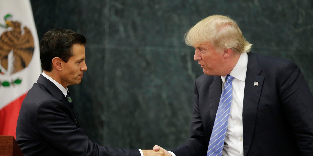 President Donald Trump and Mexican President Enrique Peña Nieto shake hands at the Los Pinos presidential residence in Mexico City, August 31, 2016.