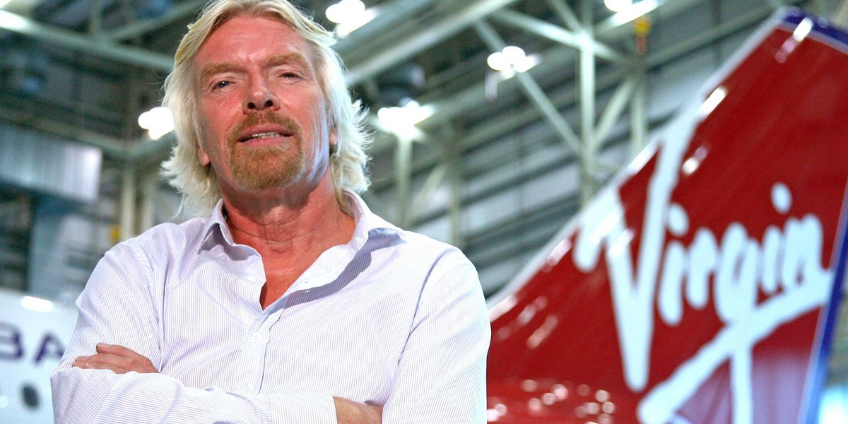 Richard Branson won a bet with a rival CEO that involves 'a knee in the groin' — and he's ready to collect