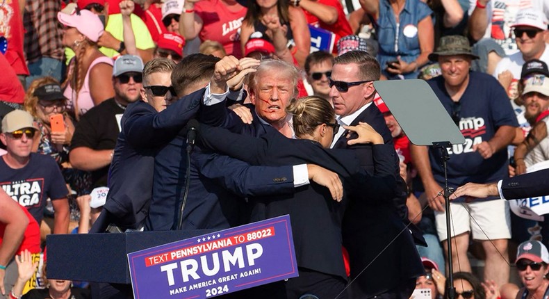 The Secret Service surrounded Donald Trump after an assassination attempt at a rally in Pennsylvania.REBECCA DROKE/ Getty Images