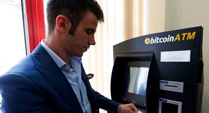 Rotariu uses Romania's first bitcoin ATM in downtown Bucharest