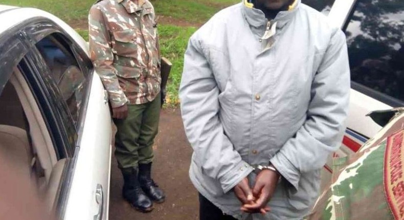 File image of a suspect during a past arrest. Deputy OCS Sabina Kerubo arrested after body of Star journalist Eric Oloo was found in her house