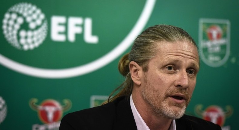 Former midfielder Emmanuel Petit was at the heart of Arsenal's glory days under embattled manager Arsene Wenger but he said fans risked fixating on that era without understanding the present