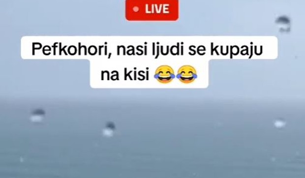 Kupanje Srba po kiši
