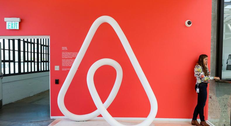 FILE PHOTO: A woman talks on the phone at the Airbnb office headquarters in the SOMA district of San Francisco, California, U.S., August 2, 2016.  REUTERS/Gabrielle Lurie