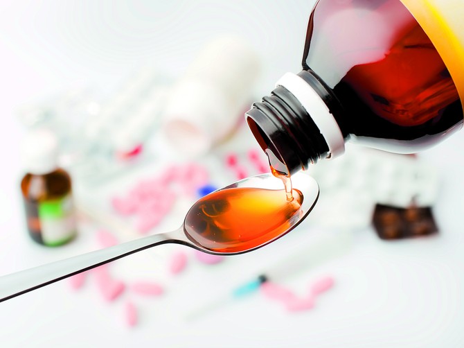 128570_stockphotosyrupfrombottleinspoonpouring353419742