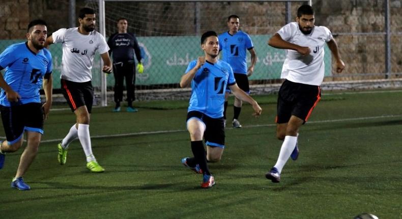 Inside Jerusalem's walled Old City, a month-long football tournament takes place in which the largest Palestinian families play each other to be dubbed champions of the city