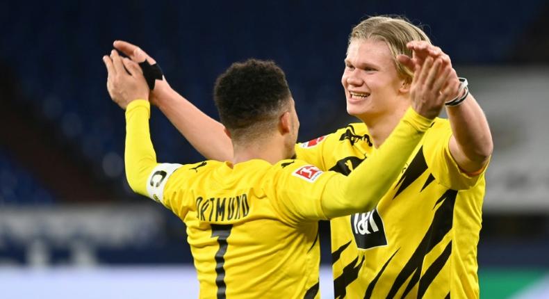 Striker Erling Braut Haaland (R) and England winger Jadon Sancho both scored in Dortmund's derby win on Saturday