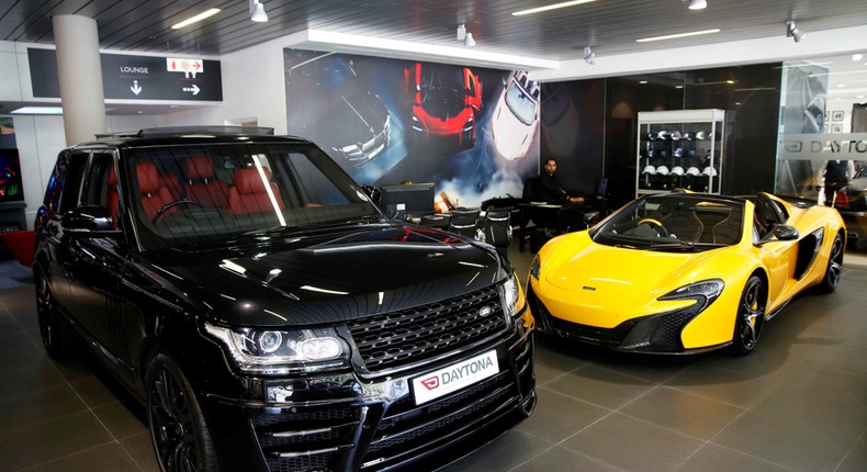 British-made luxury sports cars Range Rover and McLaren.