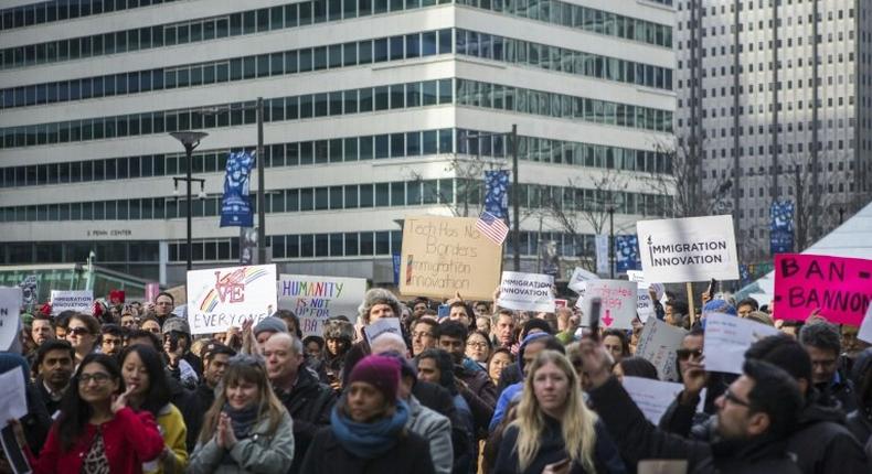 Comcast tech employees walk out of work to rally against President Trump's recent immigration order on February 2, 2017 in Philadelphia, Pennsylvania