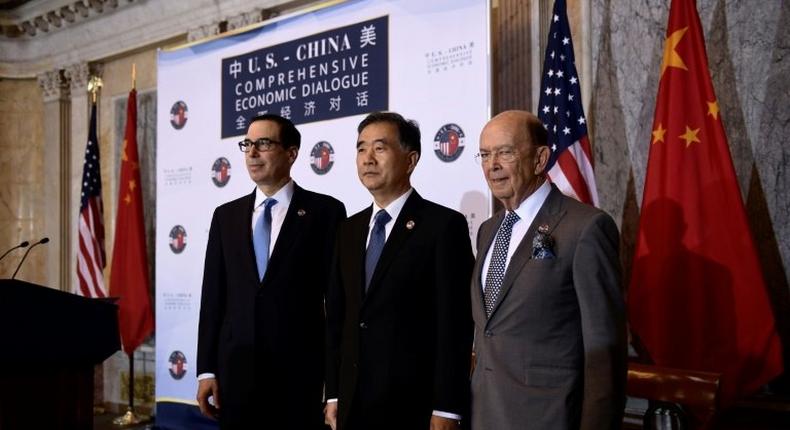 Treasury Secretary Steven Mnuchin, Chinese Vice Premier Wang Yang and Commerce Secretary Wilber Ross (L to R) open trade talks, with the US officials demanding more 'fair and reciprocal' trade with China