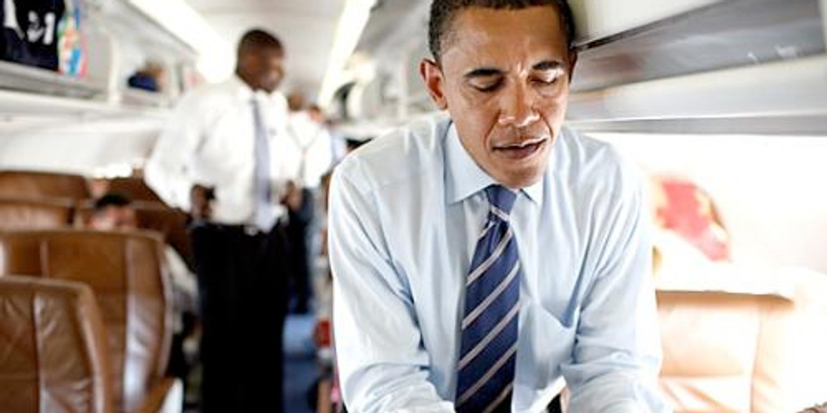 Former President Barack Obama, probably texting Michelle to make dinner plans.