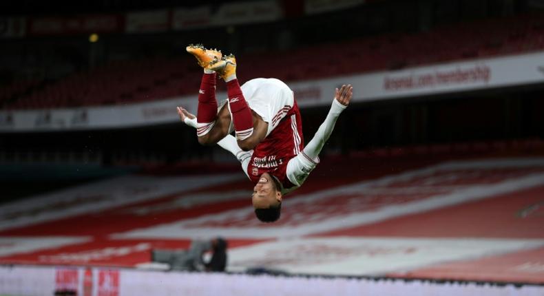 Head over heels: Pierre-Emerick Aubameyang scored just his fourth Premier League goal of the season for Arsenal