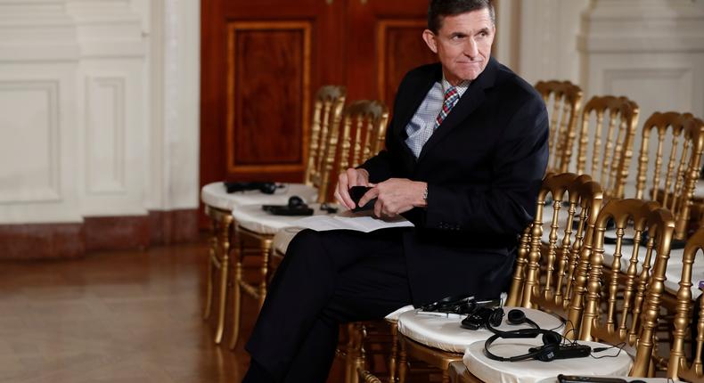 National Security Adviser Michael Flynn sits in the front row before the start of the President Donald Trump and Japanese Prime Minister Shinzo Abe joint news conference in the East Room of the White House, in Washington, Feb. 10, 2017.