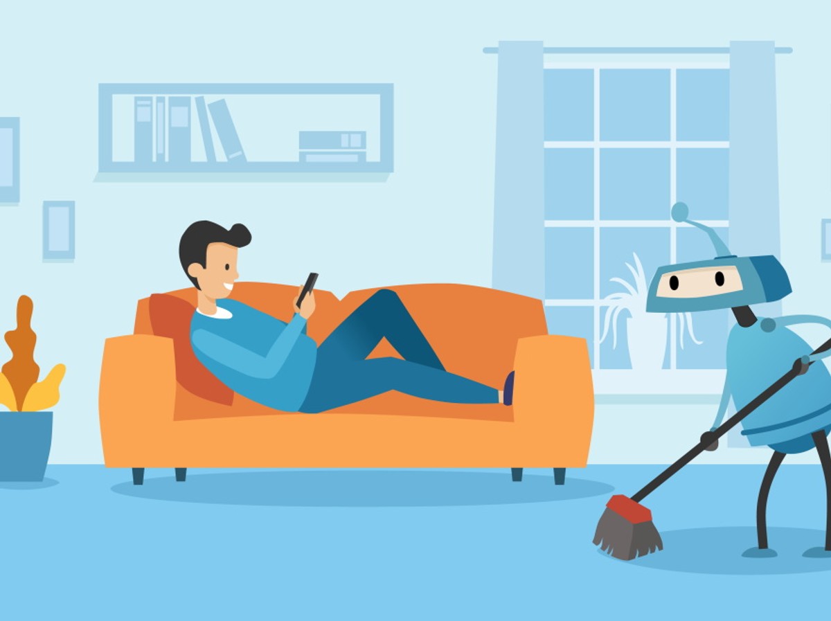 Robot sprząta mieszkanie. Mężczyzna odpoczywa.