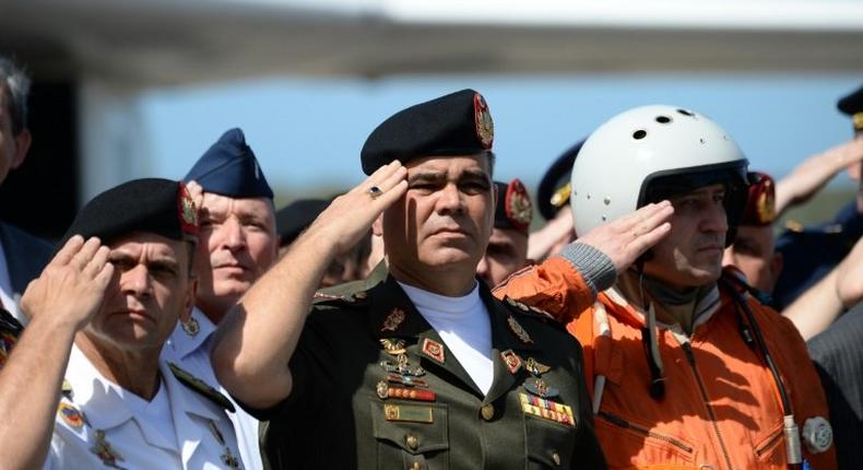 Venezuelan Defence Minister Vladimir Padrino (C) after the arrival of two Russian strategic long-range heavy supersonic bomber aircraft just north of Caracas, on December 10, 2018: Colombia dubs the move provocative