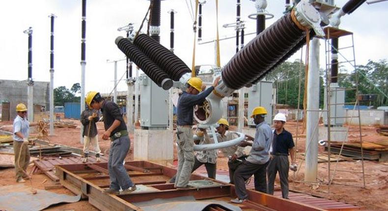 Workers on an electricity site