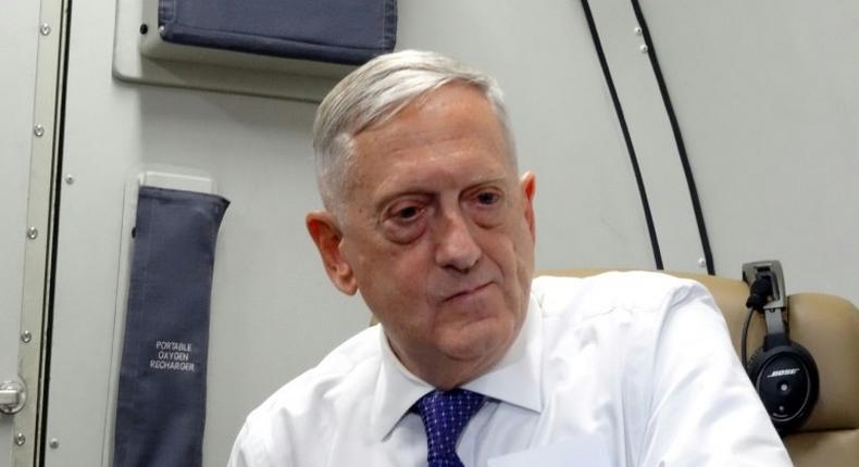 US Defense Secretary James Mattis speaks to reporters on board a flight on August 20, 2017