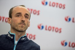 Kubica spotkał się z niewidomą dziewczynką. 'Poznasz mnie po dużym nosie' [WIDEO]