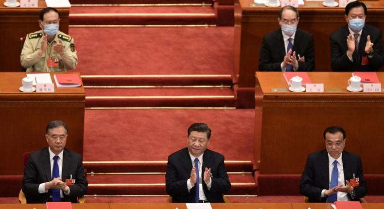 China's rubber-stamp parliament voted nearly unanimously to approve plans to impose the security law on Hong Kong