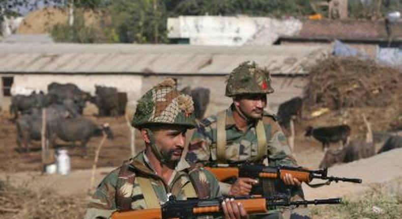 Indian army soldiers stand guard near the Indian Air Force (IAF) base at Pathankot in Punjab, India, January 3, 2016.